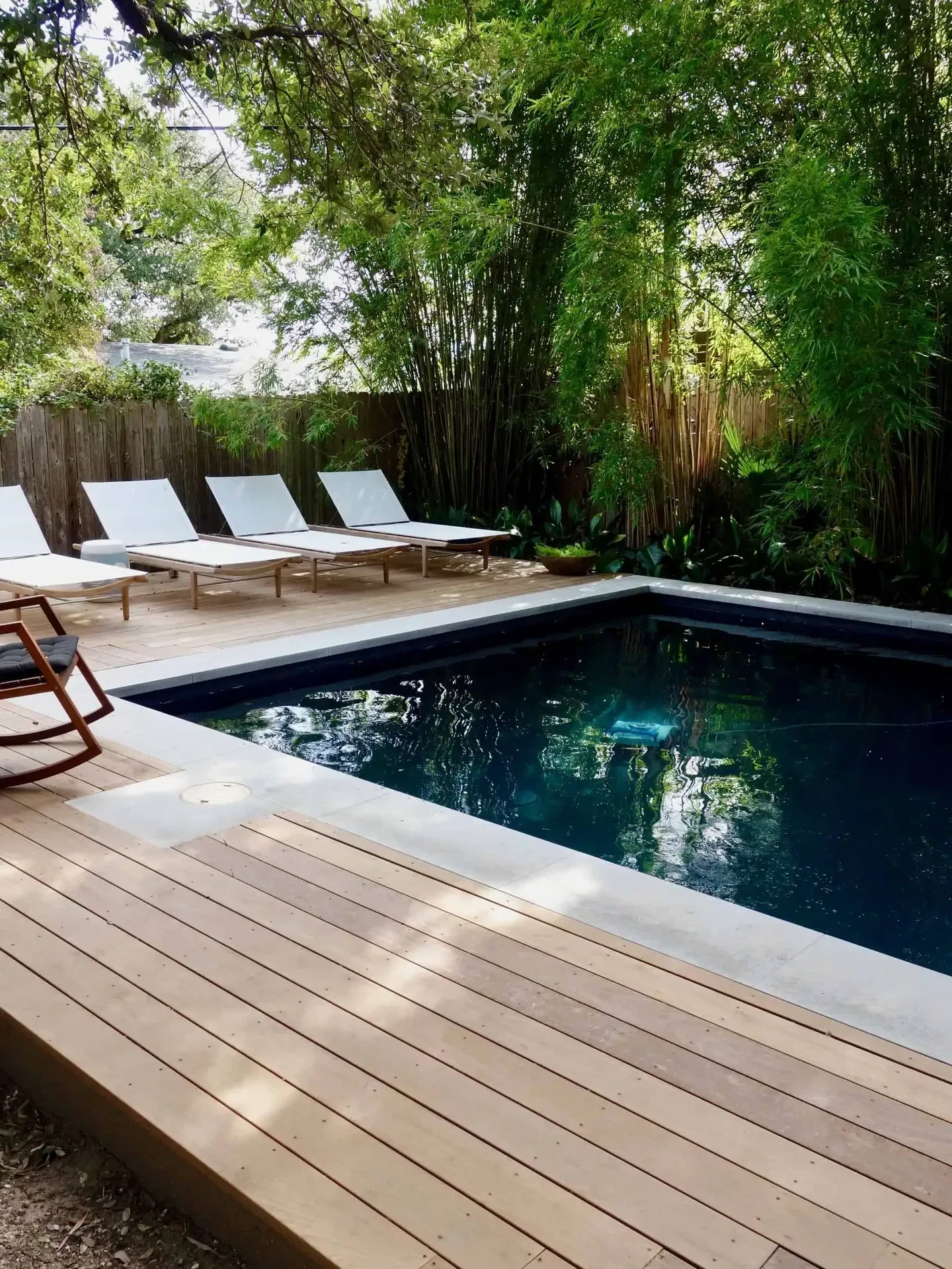 Multi-level outdoor living space with natural stone hardscape Barton Creek Austin TX