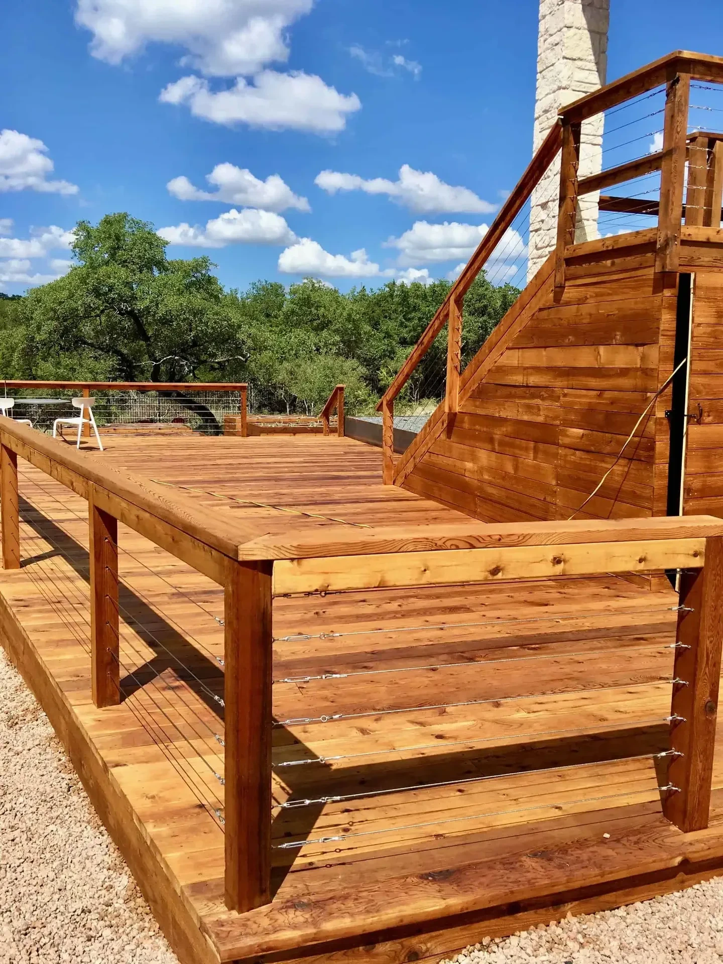 Barton Plunge — 20-foot shipping container plunge pool with Raypak heat/cool, Western Red Cedar cladding, marbled concrete deck, FCOB underwater lighting — Barton Creek Austin TX