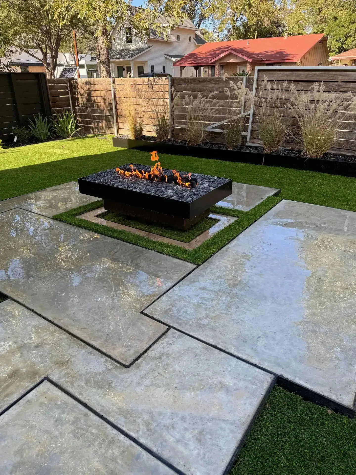Custom concrete patio pads with fire pit Austin TX