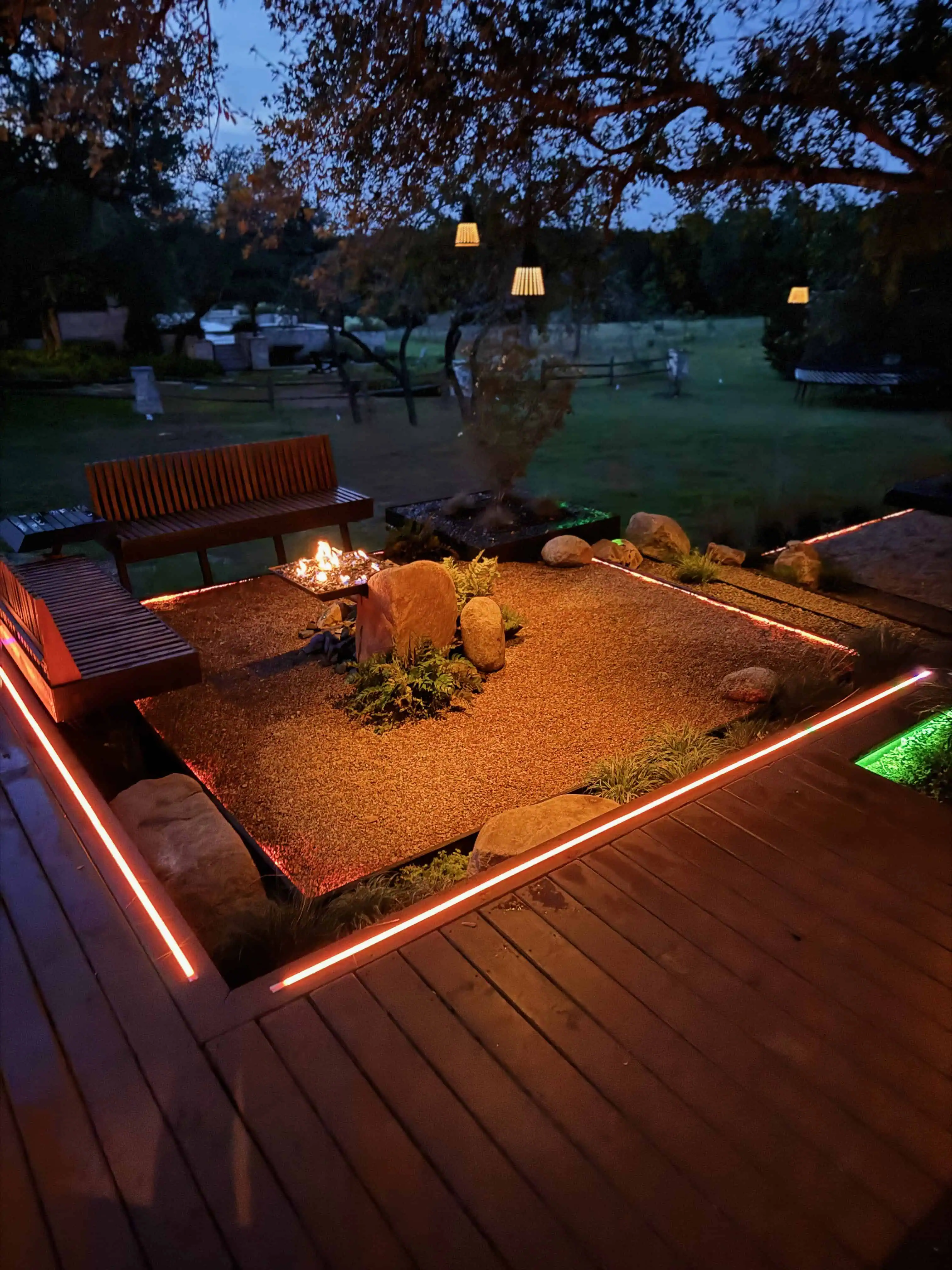 Steel terraces with glass planters and COB lighting Circle C Austin TX