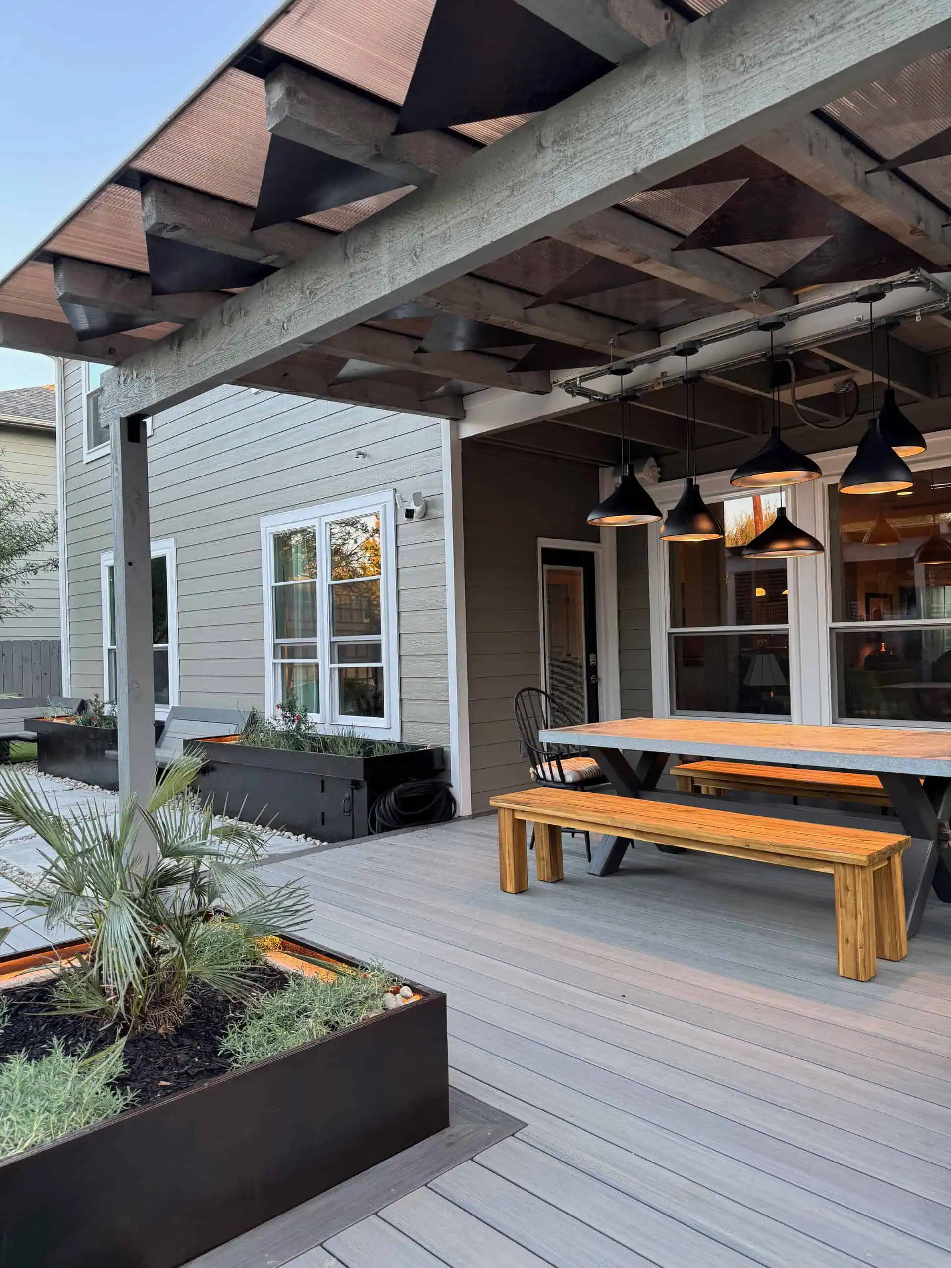 Reframed pergola with custom-cut steel triangle cap — Circle C, Austin TX