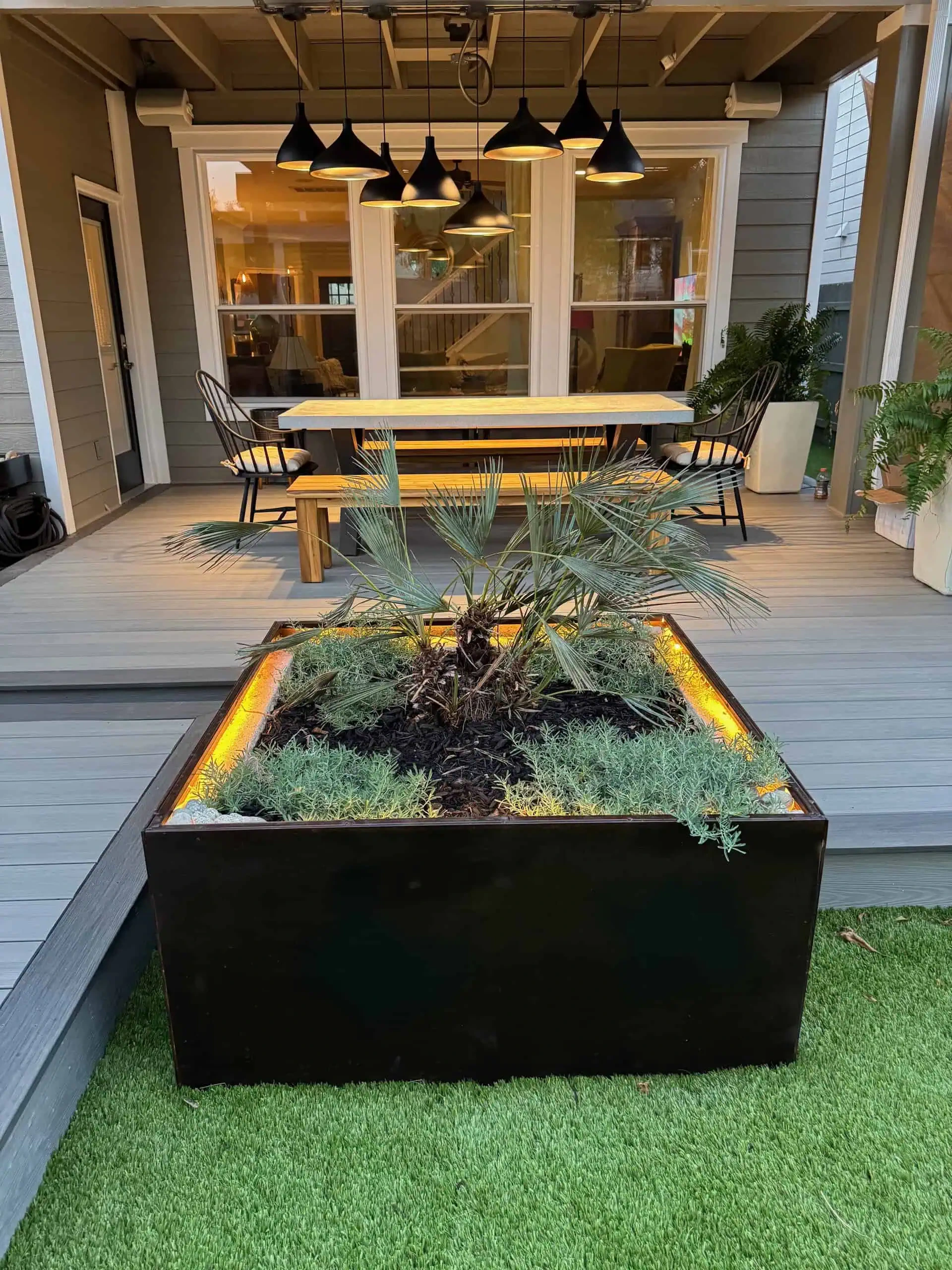 Cantilevered steel planters with integrated COB lighting — Circle C, Austin TX