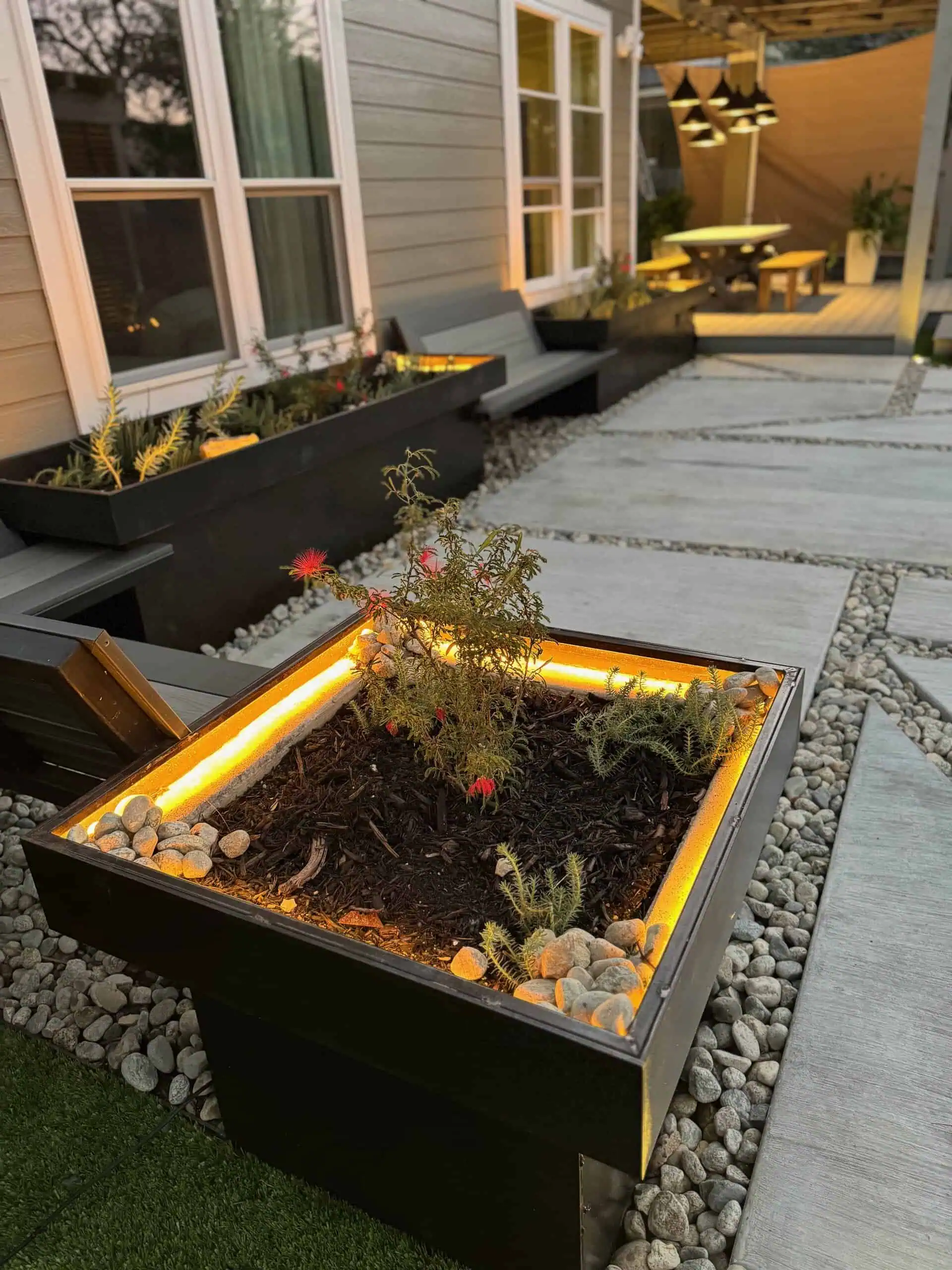 Cantilevered steel planter with integrated COB lighting — Circle C, Austin TX