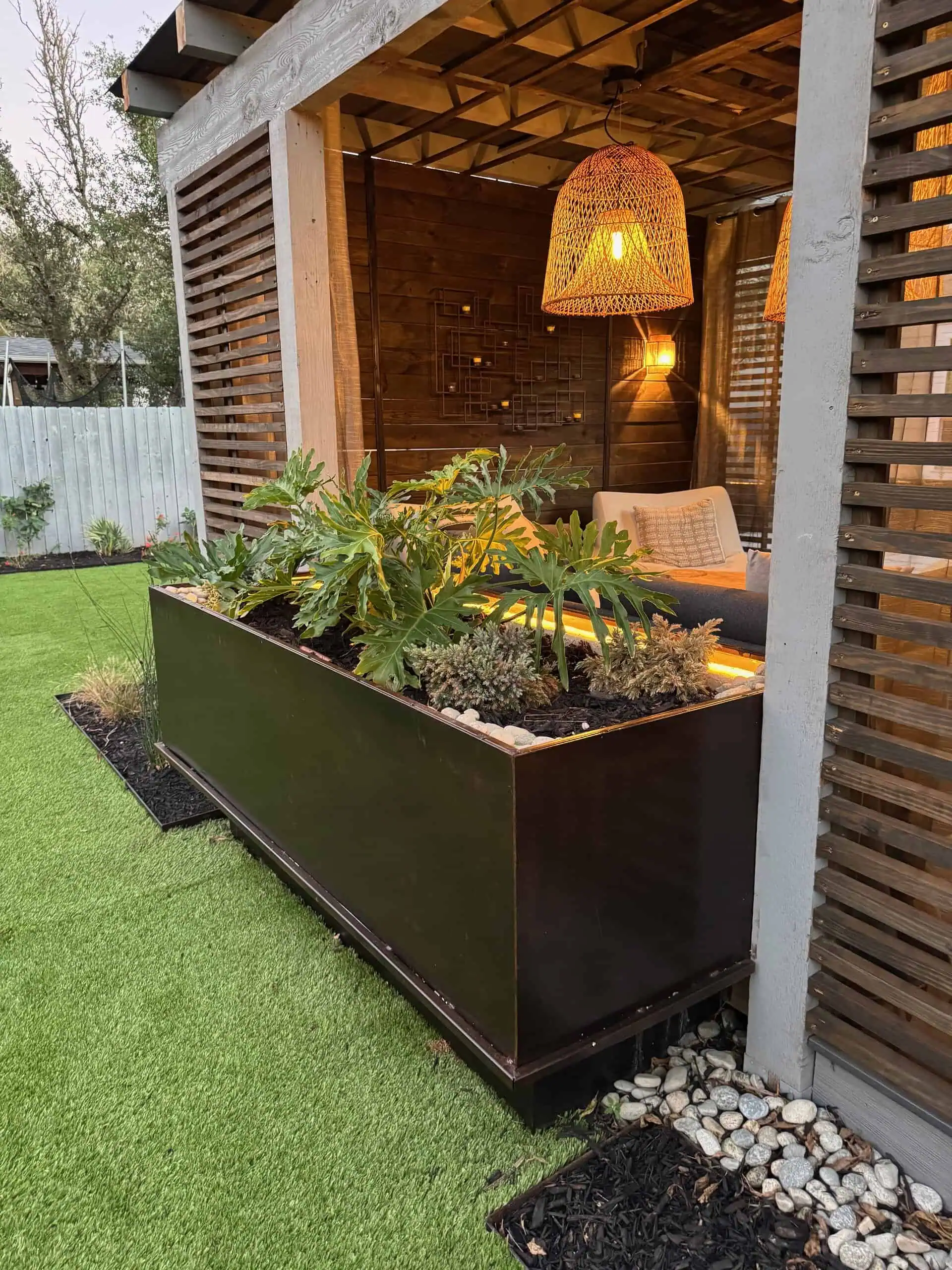 Pergola with Corten steel planter and privacy wall Austin TX