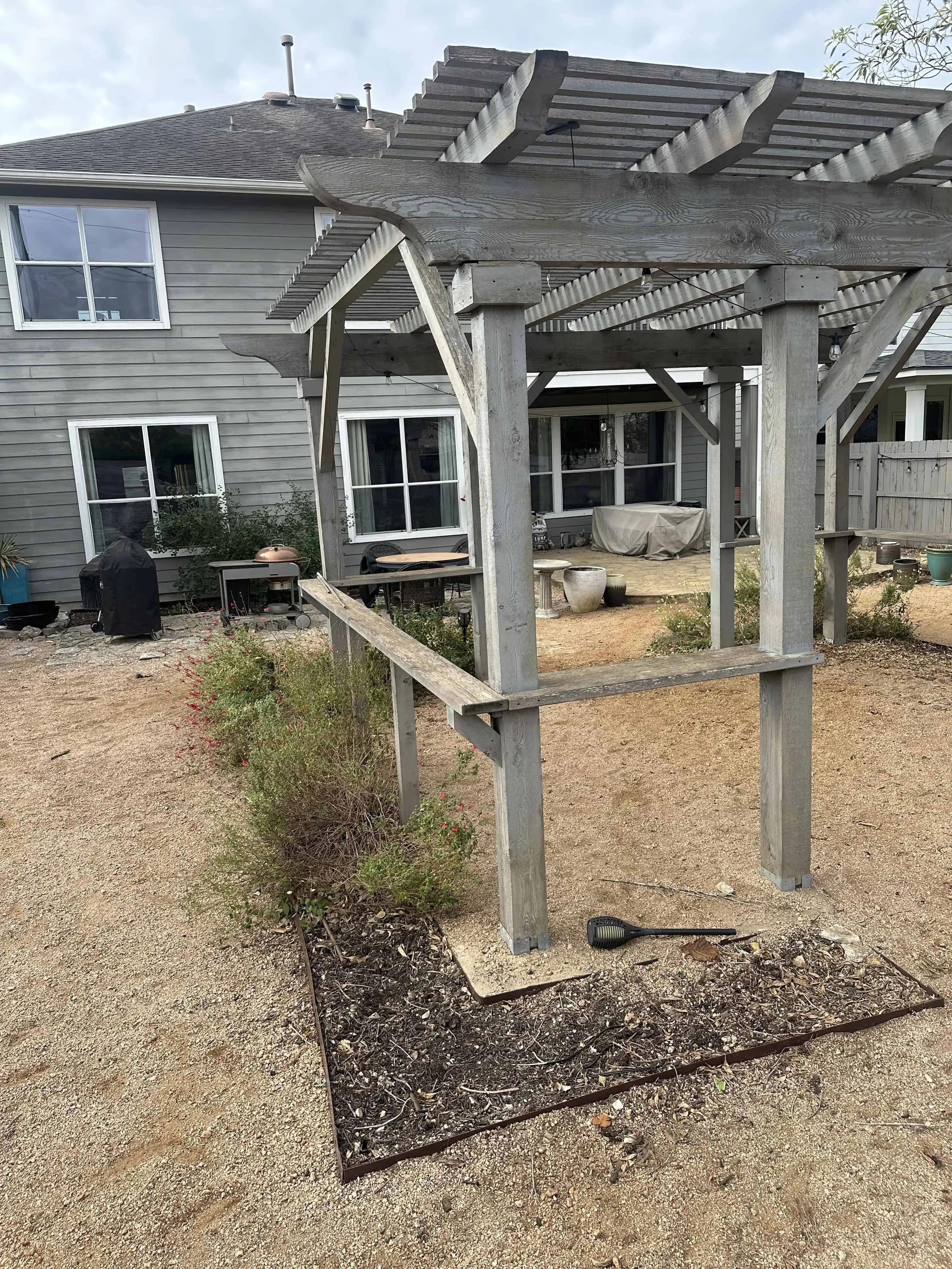 Hopeland project before — basic backyard with old pergola