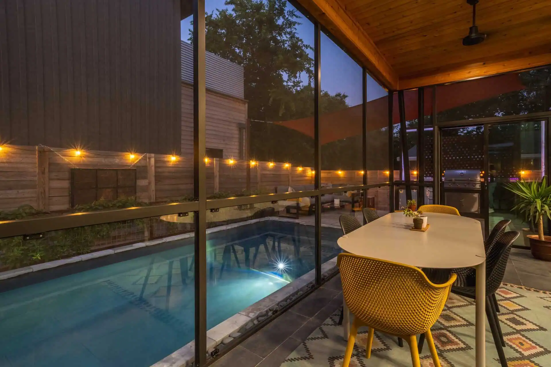 Screened glass porch interior with cedar ceiling — East Austin TX