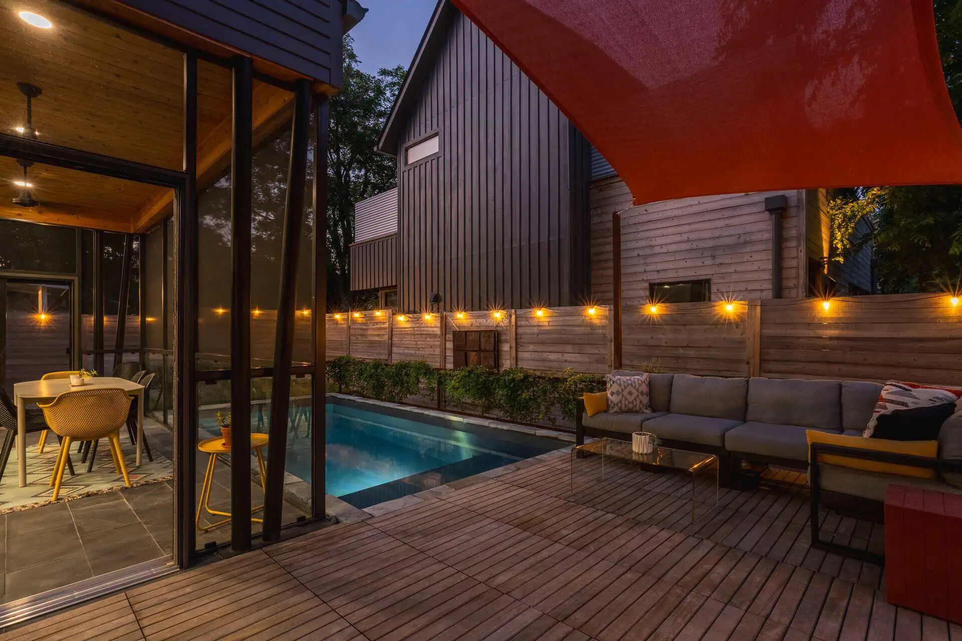 Teak deck, pool, and screened glass porch — East Austin TX